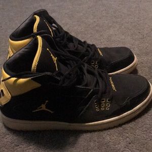 Black and yellow Jordan’s